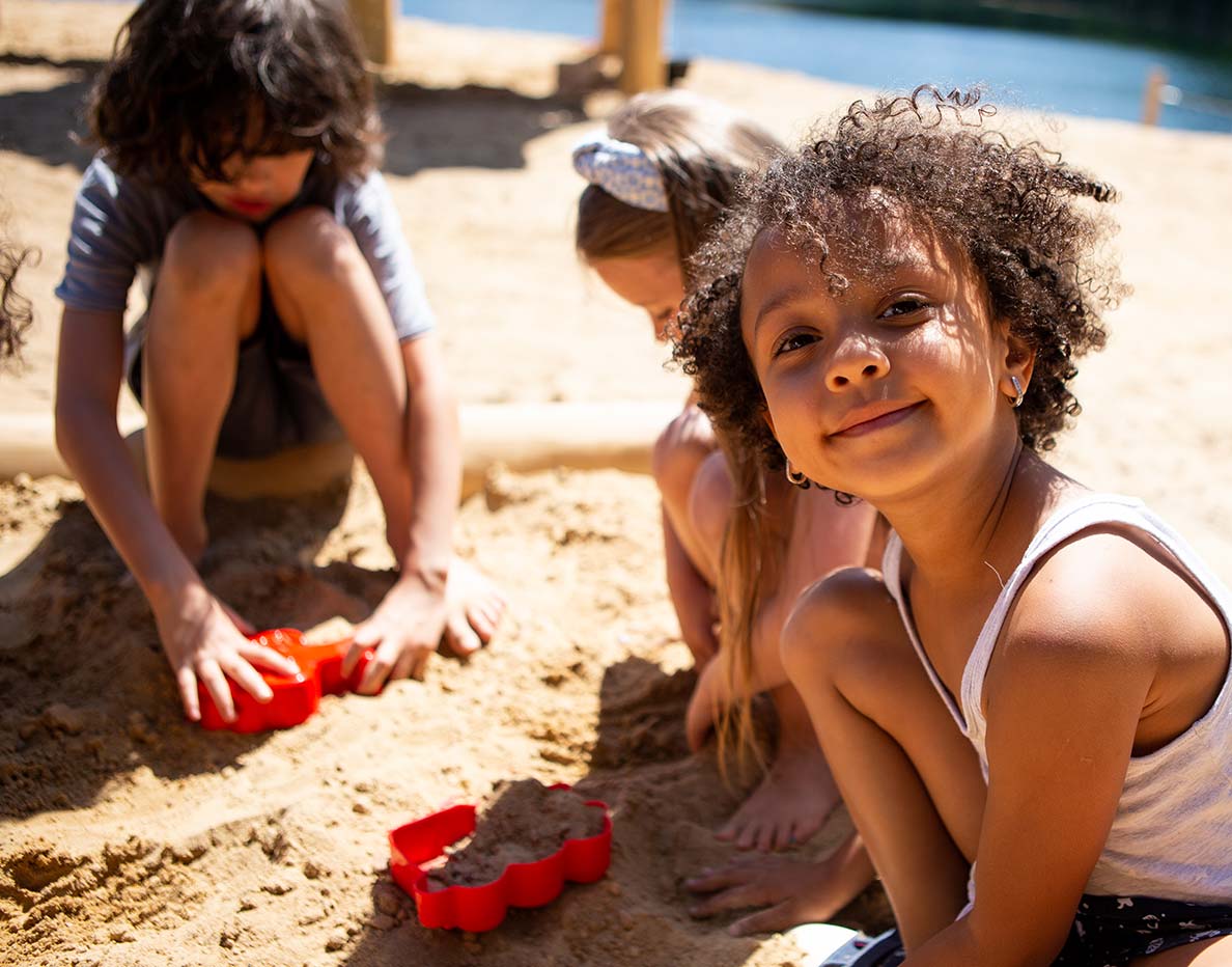 Children playing with sand and water