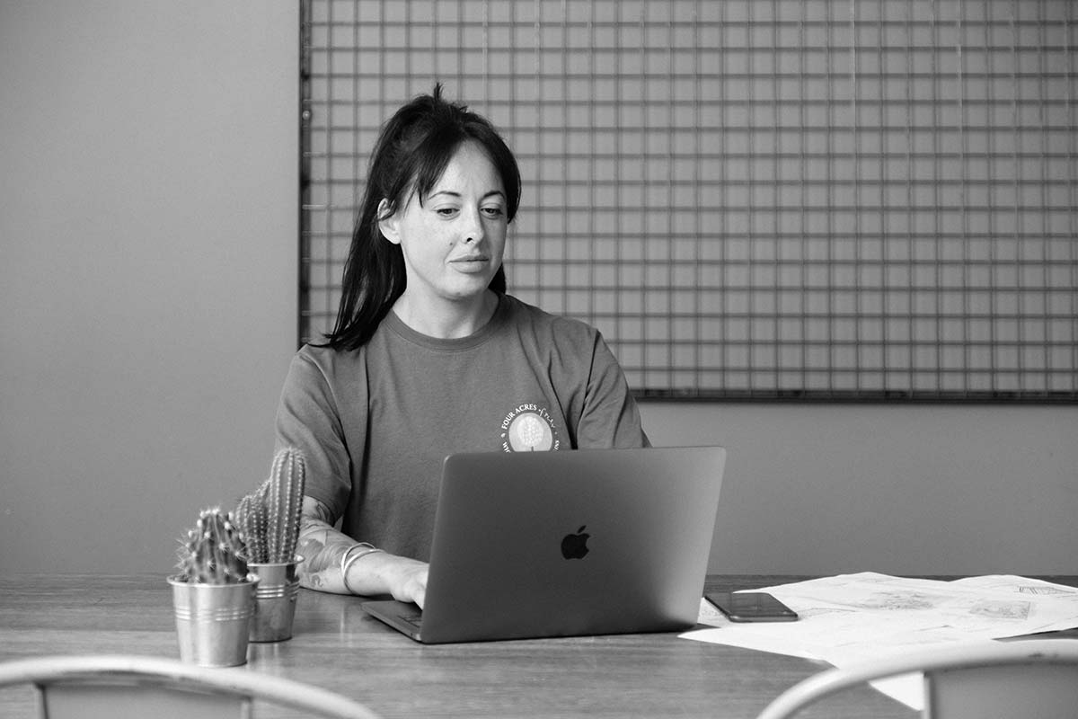 Holly working on a computer