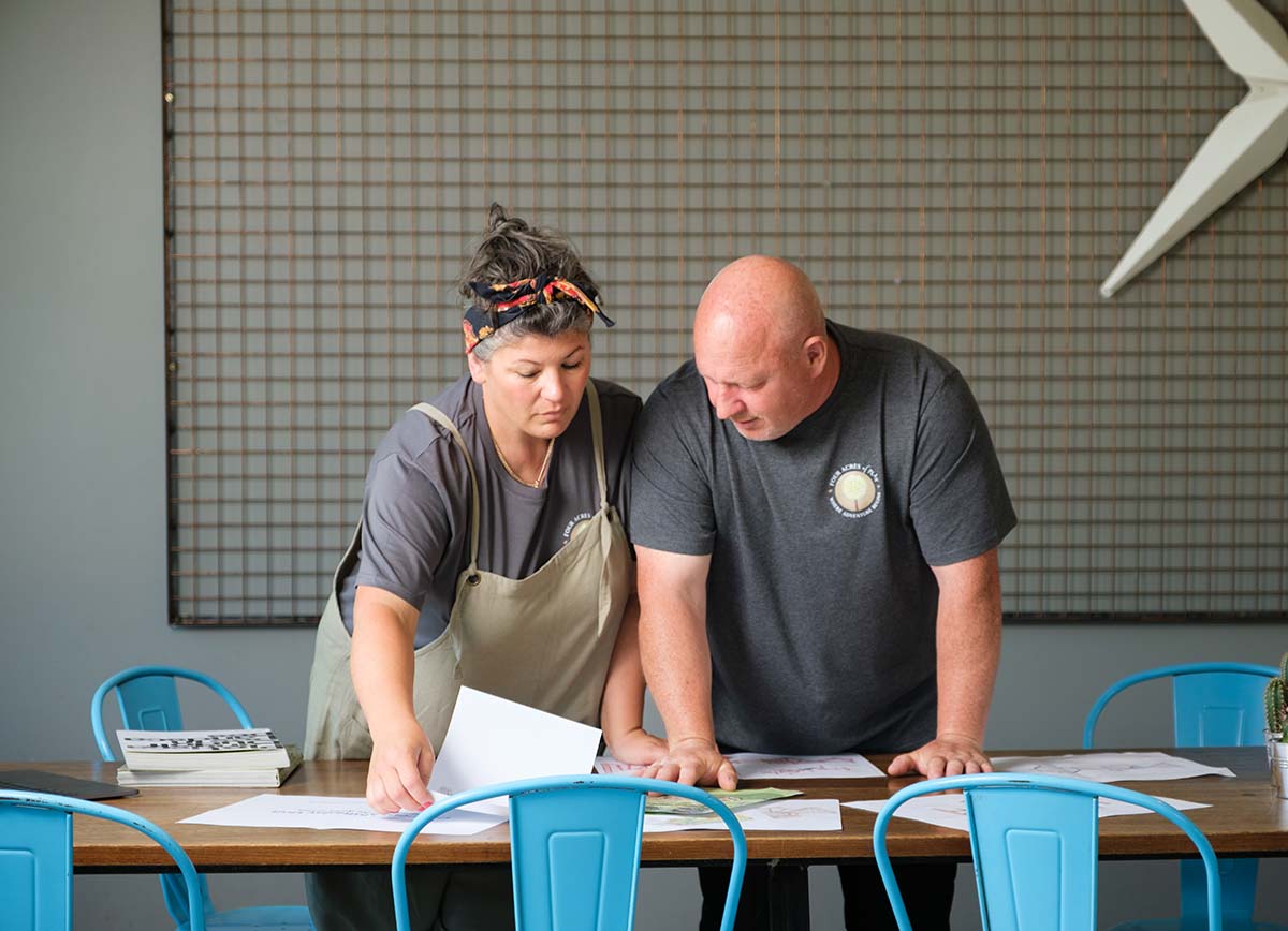 Lisa and Lee discussing a project